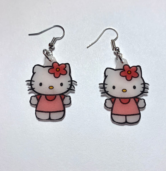 Hello Kitty charm dangle earrings | Hello kitty, Dangle earrings, Dangles